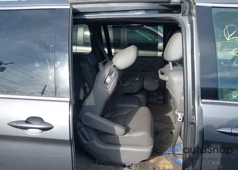 2010 Honda Odyssey Ex-L z USA, uszkodzony, nr VIN 5FNRL3H70AB021452